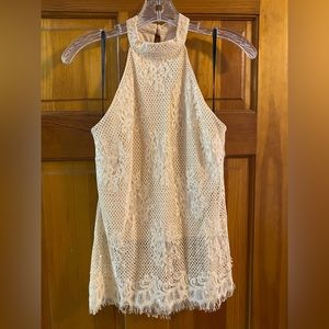 Detailed lace throughout tank top